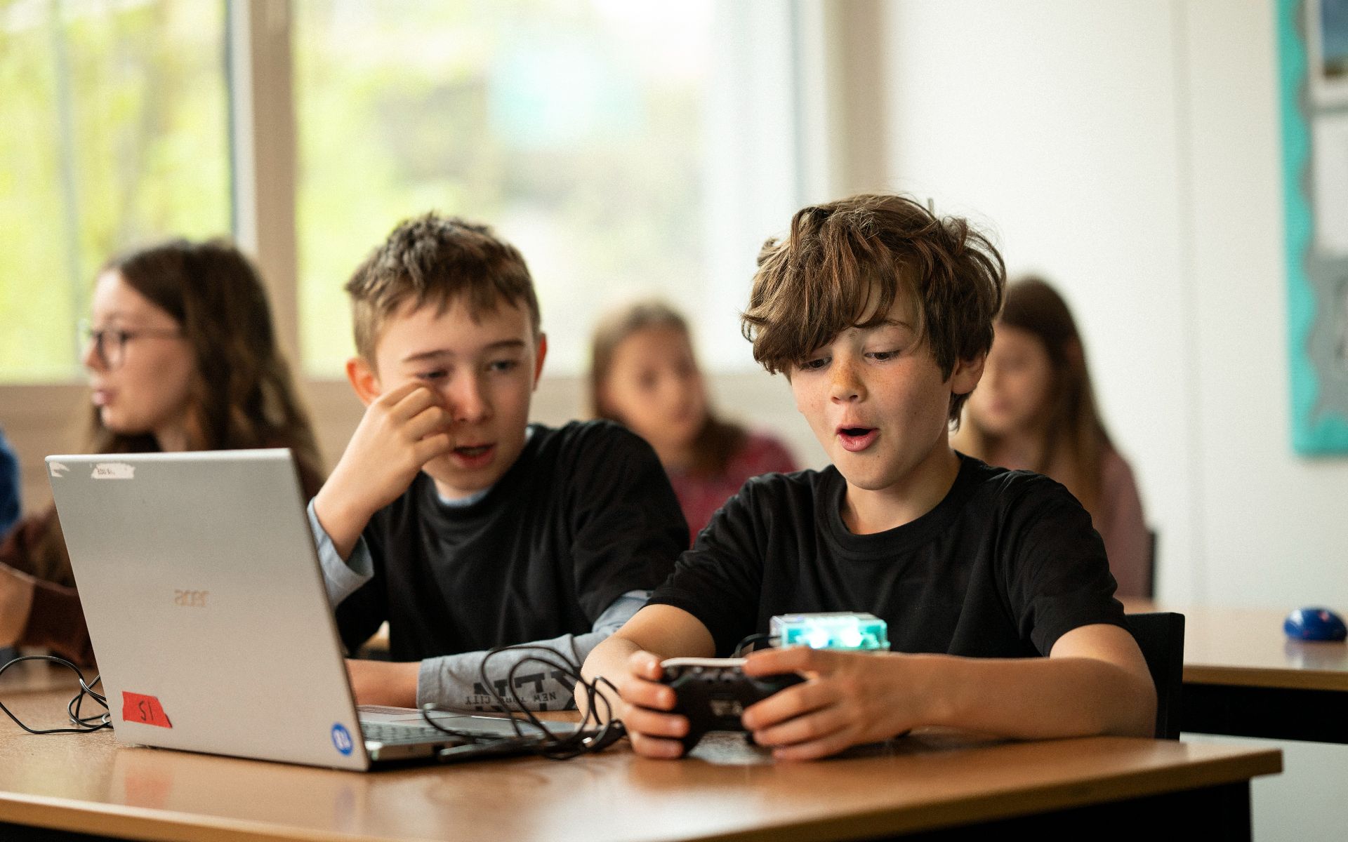 photo of two students in class